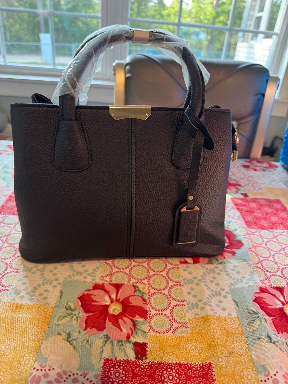Classic Black Satchel Handbag with Gold Accent